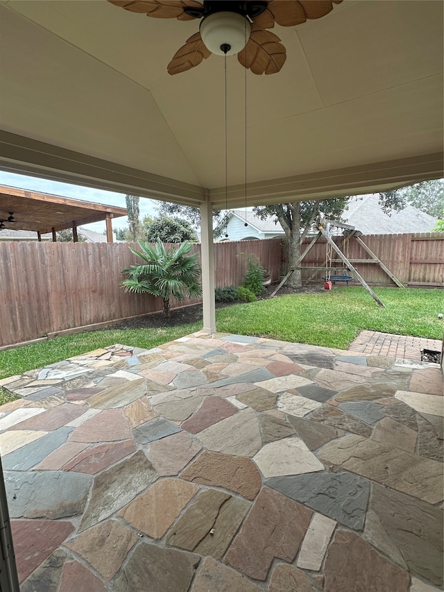 view of patio with ceiling fan