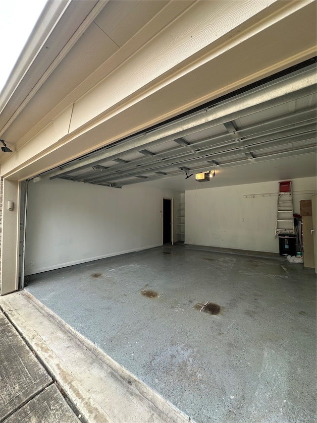 garage featuring a garage door opener