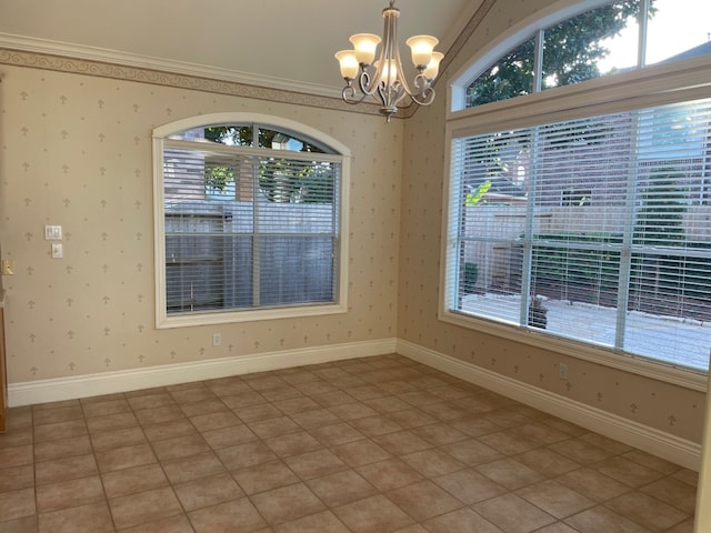 unfurnished dining area featuring tile patterned floors, a wealth of natural light, and a notable chandelier