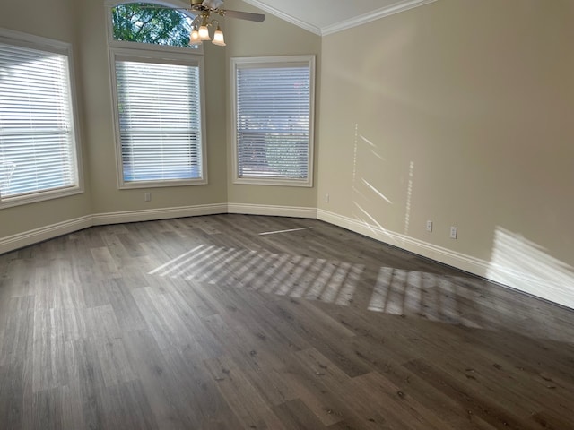 unfurnished room with ceiling fan, dark hardwood / wood-style flooring, and ornamental molding