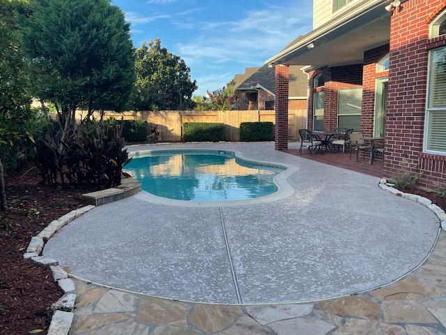 view of pool with a patio