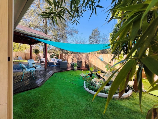 view of yard featuring an outdoor hangout area and a wooden deck