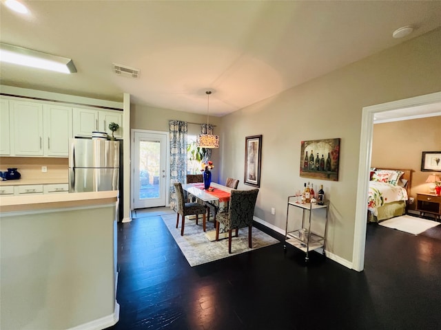 dining room featuring dark wood-type flooring