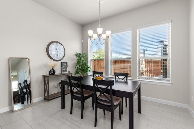 dining room featuring a chandelier