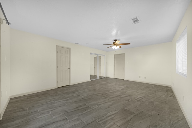 empty room with ceiling fan