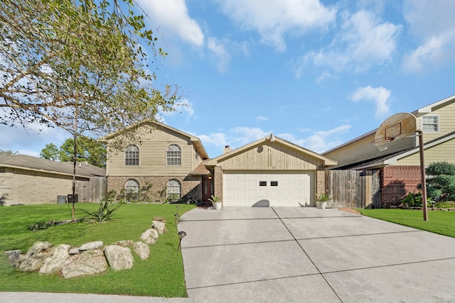 view of front facade with a front lawn and a garage