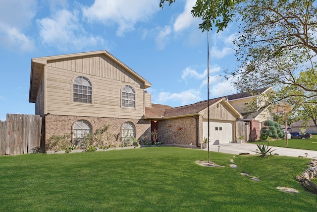 view of front property with a garage and a front lawn