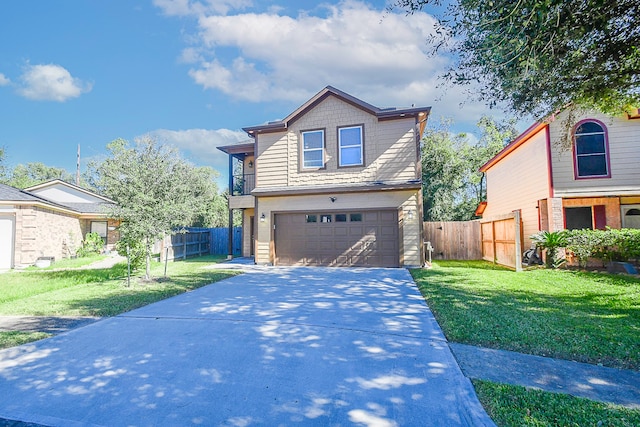 view of front of house featuring a garage and a front lawn