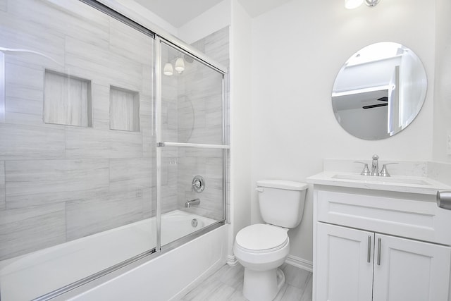 13754 Lynx Dr, Houston, TX 77014 - full bath featuring toilet, vanity, bath / shower combo with glass door, and baseboards