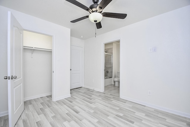 13754 Lynx Dr, Houston, TX 77014 - unfurnished bedroom featuring light wood-style floors, a closet, baseboards, ensuite bath, and a ceiling fan