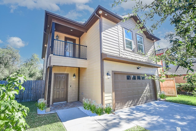13754 Lynx Dr, Houston, TX 77014 - view of front of house with a balcony and an attached garage