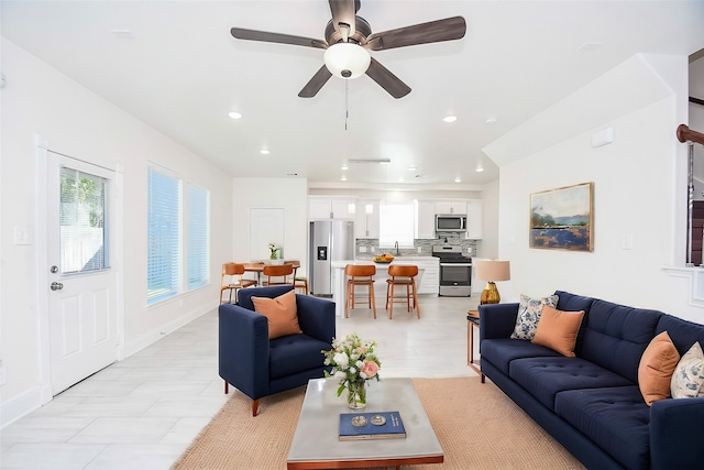 living room with ceiling fan