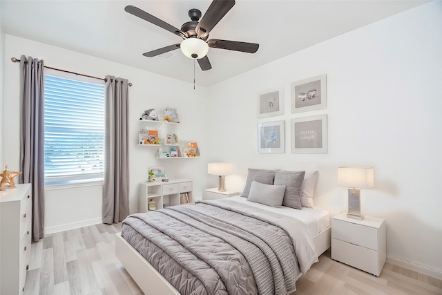 bedroom featuring ceiling fan and light wood-type flooring