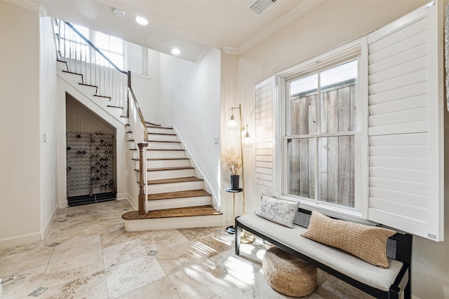 interior space featuring ornamental molding