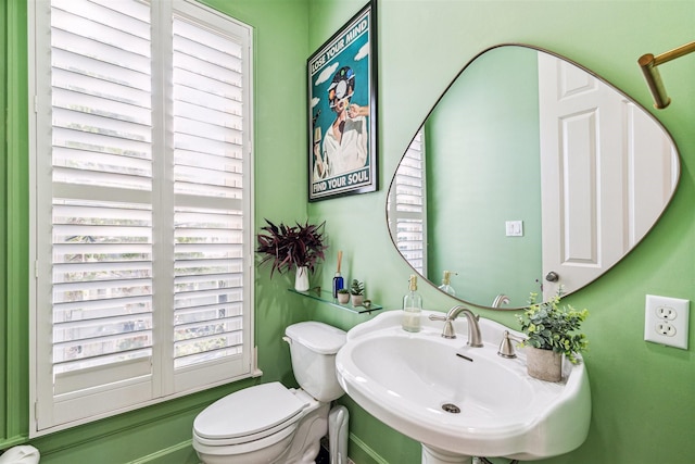 bathroom with sink and toilet