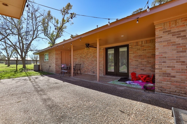 back of house featuring a patio, central AC, and ceiling fan