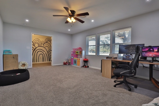 carpeted office with ceiling fan