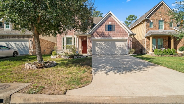 view of front of home featuring a garage and a front lawn