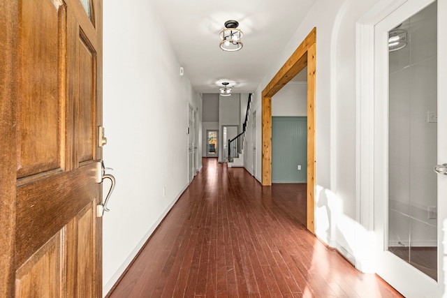 hallway featuring dark hardwood / wood-style floors