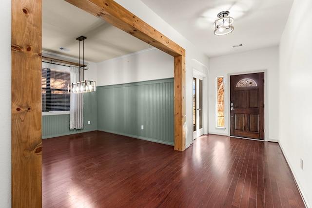 entryway with dark wood-type flooring