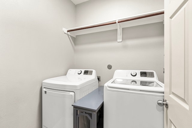 laundry area with washer and dryer