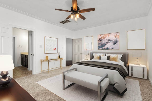 bedroom featuring light hardwood / wood-style flooring, ensuite bath, ceiling fan, and ornamental molding