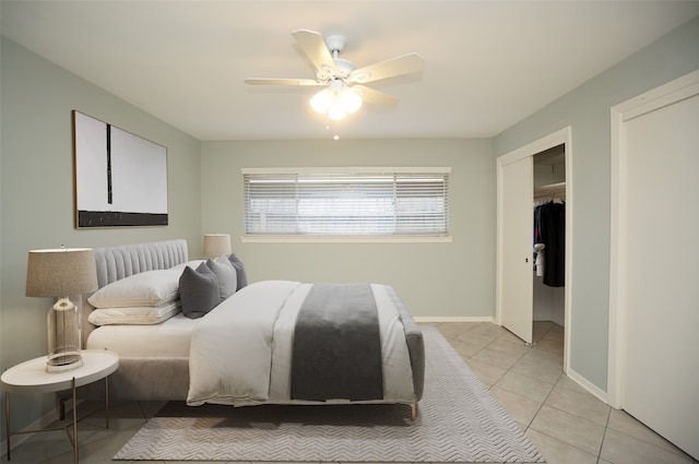 bedroom featuring ceiling fan and light tile patterned floors