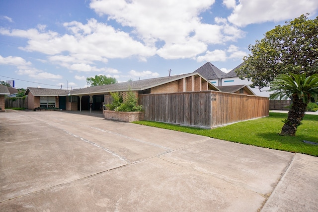 view of home's exterior featuring a yard