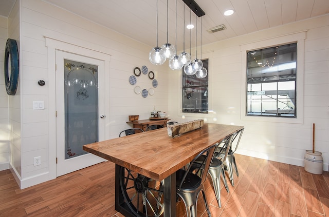 dining space featuring light wood-type flooring