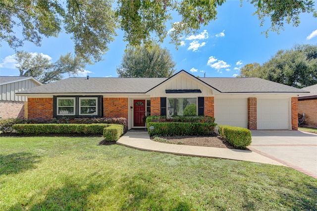 single story home with a garage and a front lawn