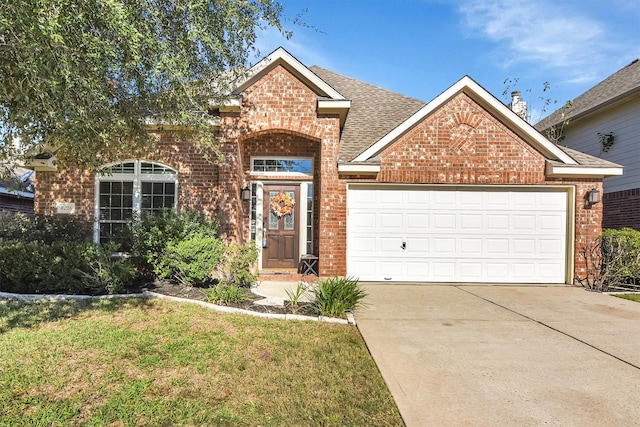 8226 Point Pendleton Dr, Tomball, TX 77375 - traditional-style home featuring brick siding, driveway, an attached garage, a shingled roof, and a front lawn