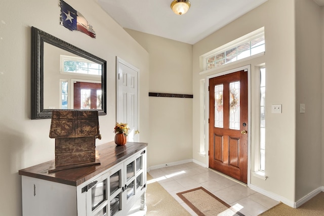 foyer featuring light tile patterned floors