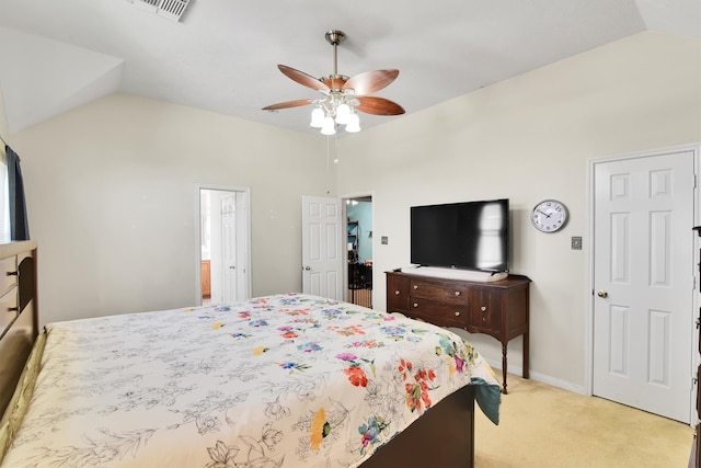 carpeted bedroom with ceiling fan and lofted ceiling