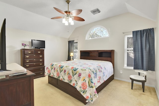 carpeted bedroom featuring ceiling fan and lofted ceiling