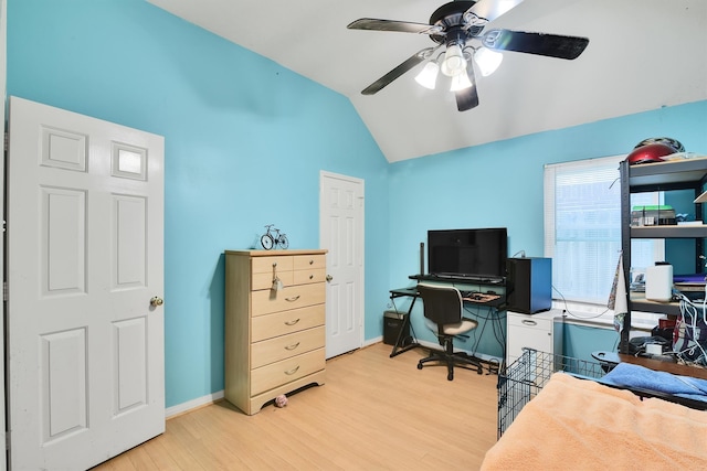 office with ceiling fan, wood-type flooring, and vaulted ceiling