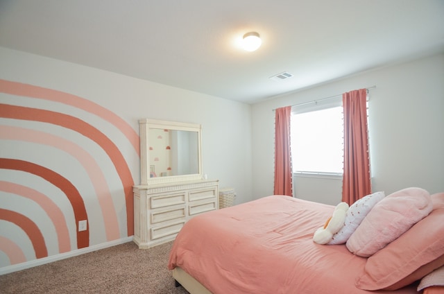 bedroom featuring light carpet