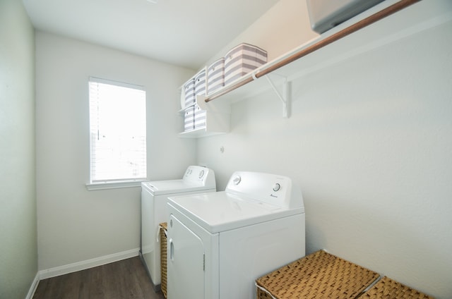 washroom with dark hardwood / wood-style floors and independent washer and dryer