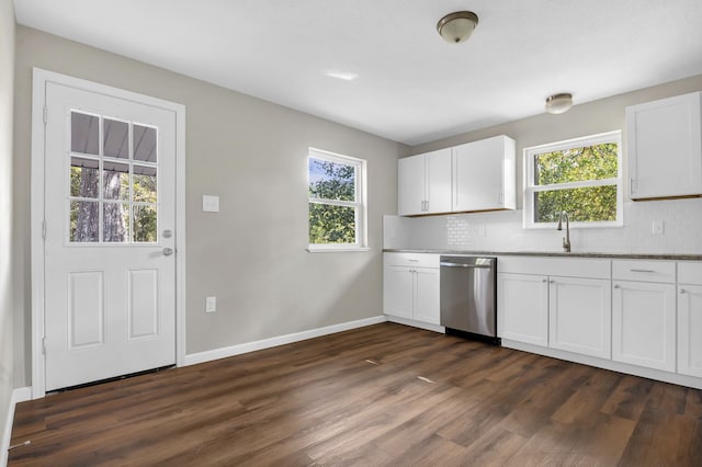 kitchen with white cabinets, a healthy amount of sunlight, and dishwasher