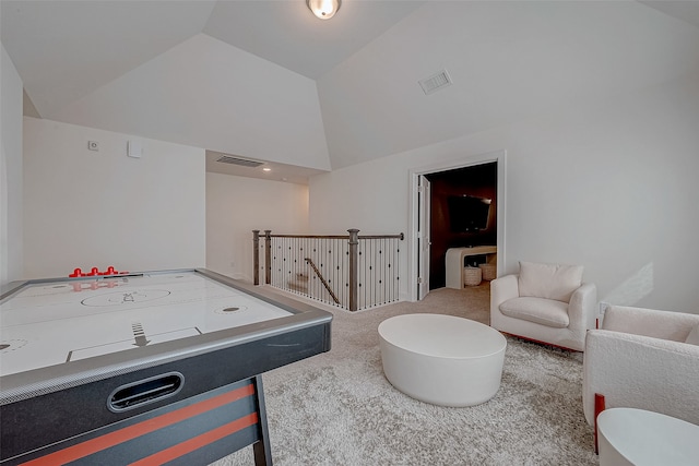 game room featuring lofted ceiling and carpet floors