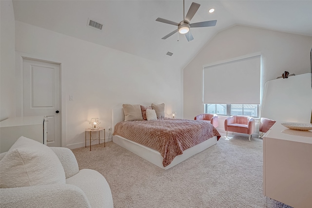 carpeted bedroom with ceiling fan and lofted ceiling