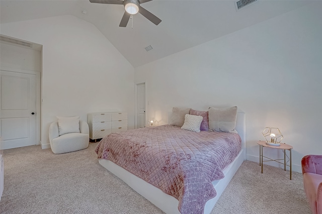 carpeted bedroom featuring ceiling fan and vaulted ceiling