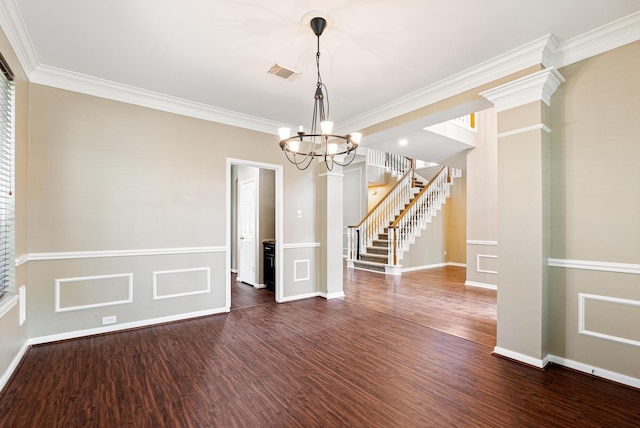 unfurnished dining area featuring a chandelier, ornamental molding, and dark wood-type flooring