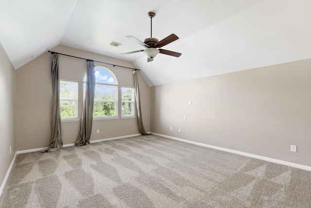 bonus room featuring light colored carpet, vaulted ceiling, and ceiling fan