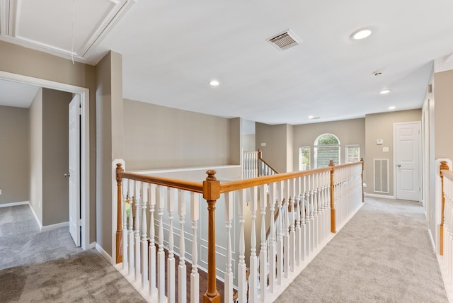 hallway with light carpet