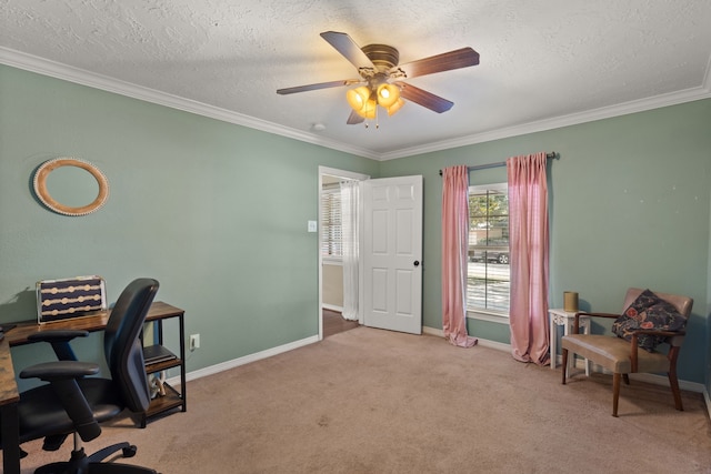 office area featuring ceiling fan, crown molding, light colored carpet, and a textured ceiling