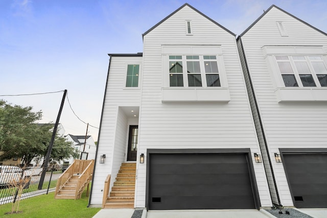 view of front of home with a garage