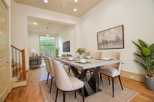 dining space featuring light hardwood / wood-style floors