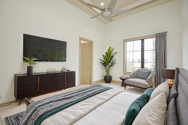 bedroom featuring ceiling fan and light colored carpet