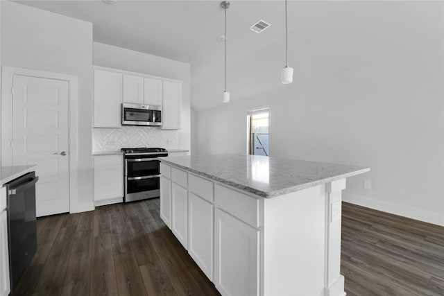 kitchen with white cabinetry, a center island, hanging light fixtures, dark hardwood / wood-style floors, and appliances with stainless steel finishes