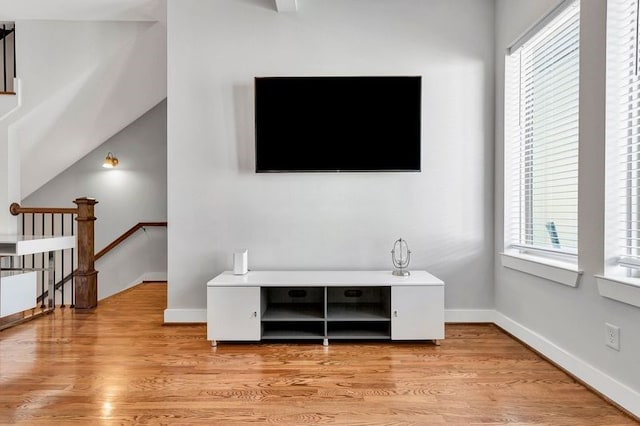 living room with light hardwood / wood-style floors